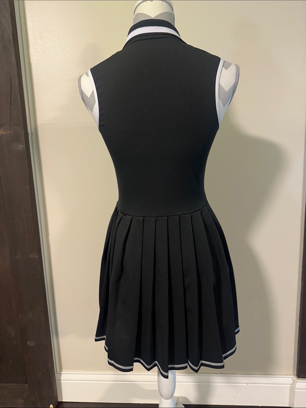 Black Sleeveless Pleated Polo Dress with White Trim - Picture 4 of 4